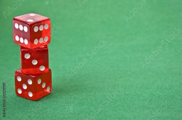 Fototapeta dice against green baize