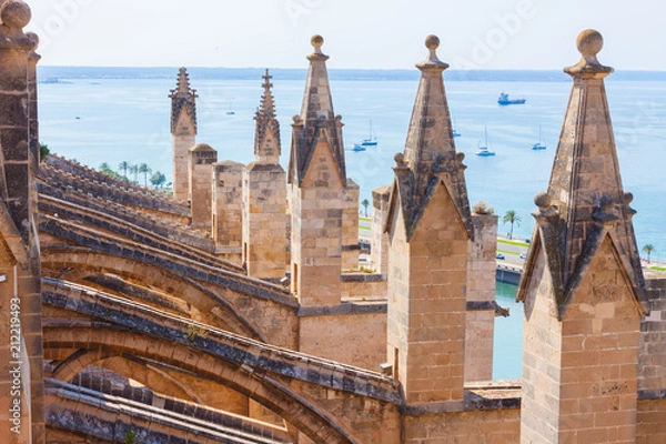 Obraz View over the sea with some boats from the terrace of the Cathedral of Santa Maria of Palma, also known as La Seu. Palma, Majorca, Spain