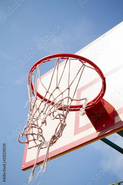 Fototapeta torn net on the basketball ring