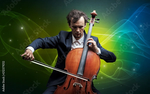 Fototapeta Serious classical cellist with fabled sparkling wallpaper