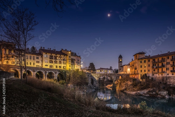Obraz An evening in Ivrea ponte vecchio old bridge, Piemonte, Italy