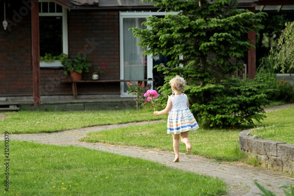 Obraz child with a flower