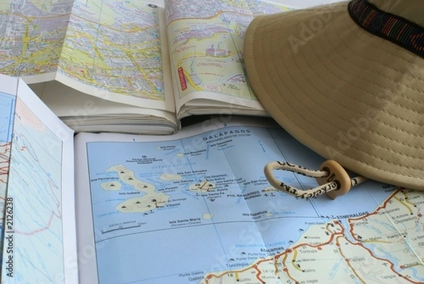 Obraz tourist maps and a cap