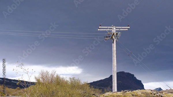 Fototapeta electricity pole before the storm