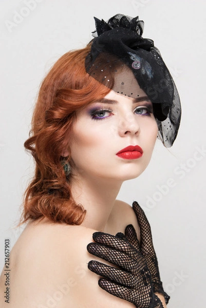 Fototapeta Close-up portrait of beautiful woman with bright makeup. Fashion shiny highlighter on skin, gloss red lips.