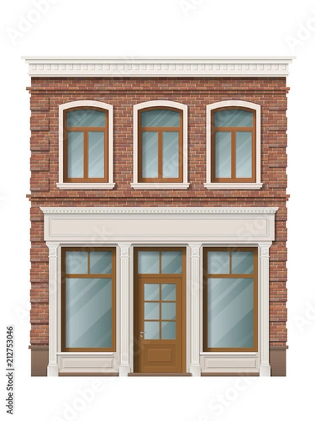 Fototapeta Old brick building facade with windows and shop on ground floor. Traditional classic architecture of front building. Storefront with large windows on the ground floor.