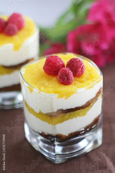 Fototapeta Tiramisu in a glass with mango