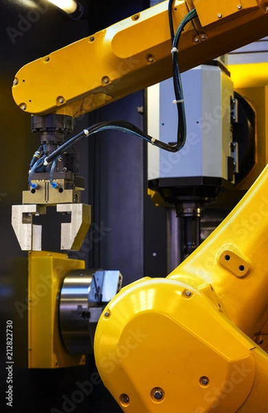 Fototapeta robotic hand machine tool with manipulator at industrial manufacture factory