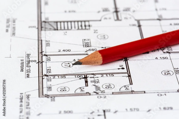 Obraz The architectural plan of the house is printed on a white sheet of paper. A red pencil on it. June 2018, Russia, Moscow
