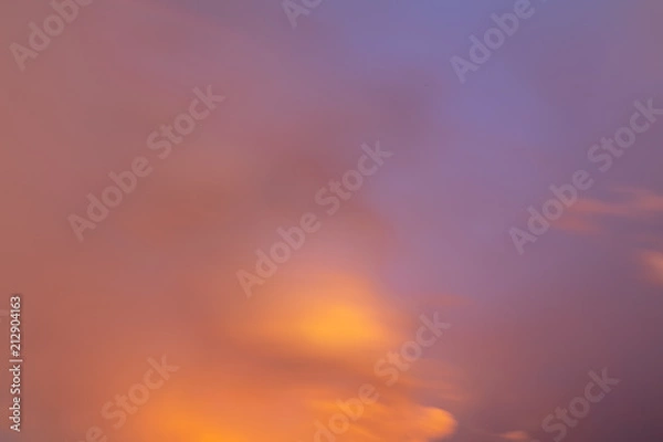 Fototapeta Clouds in the sky at sunset as background