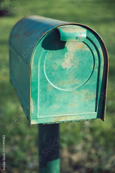 Fototapeta Old and Rusty Green American Metal Mail Box