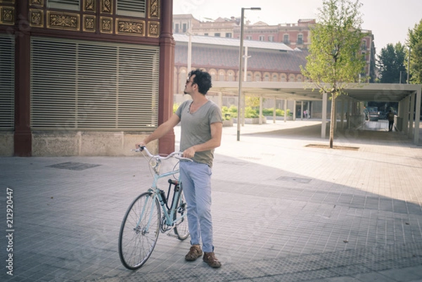 Obraz man with a vintage bicycle