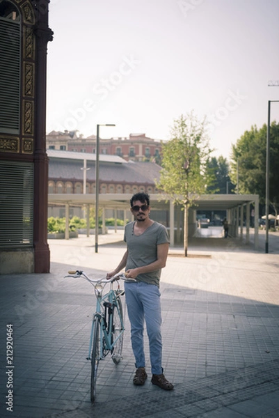 Obraz man with a vintage bicycle