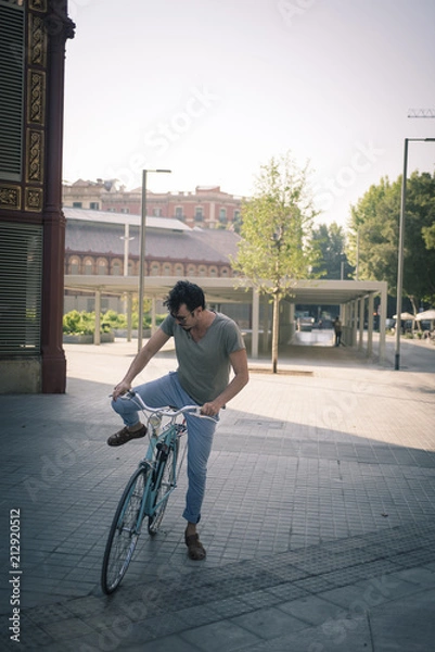 Obraz man with a vintage bicycle