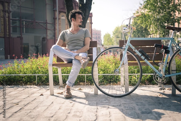 Obraz man with a vintage bicycle
