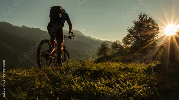 Obraz Mountain Biking at Sunset