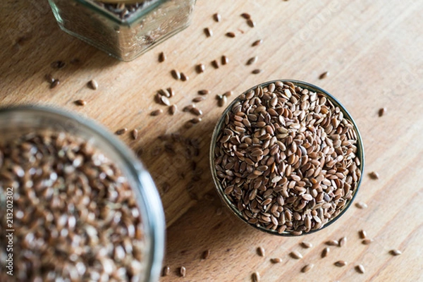 Obraz health food linseed flaxseed grain cereal in bowl on wooden table