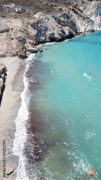 Fototapeta Aerial drone bird's eye view of iconic lunar volcanic white chalk iconic beach and caves of Sarakiniko, Milos island, Cyclades, Greece