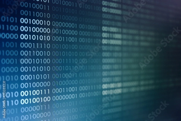 Obraz blocks of binary data. Blockchain concept. blue background with computer digital binary code bit number one and zero text. selective focus on the far end of the computer display out of focus in front.