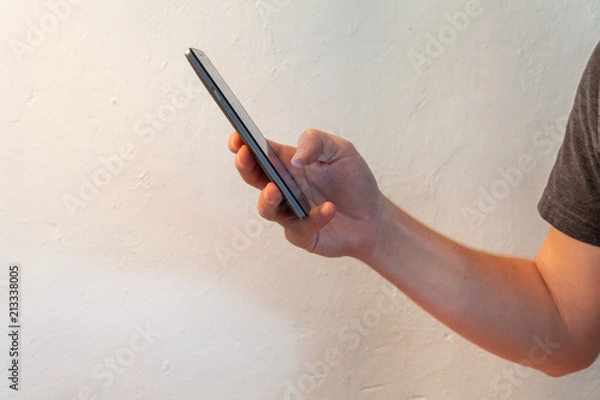 Fototapeta Using a smartphone