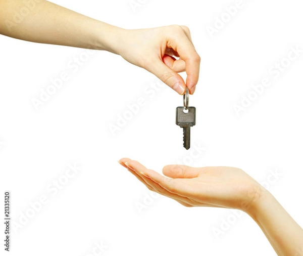 Fototapeta hand holds a key