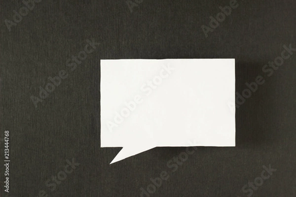 Fototapeta Symbol sign message from a white paper on a black background, social network, message, symbol