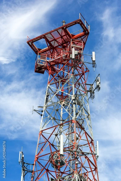 Obraz Mobile Phone Cellular Tower against blue sky and white clouds