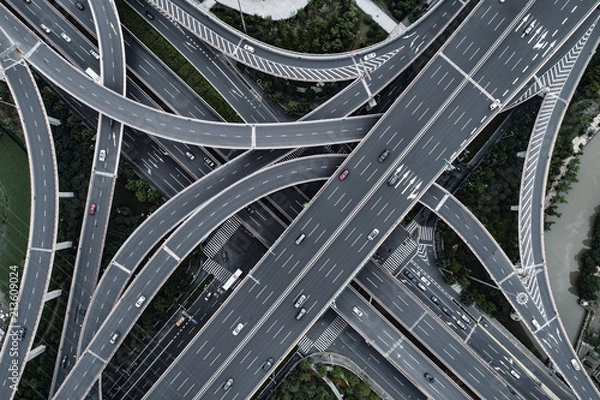 Fototapeta Aerial view of highway and overpass in city