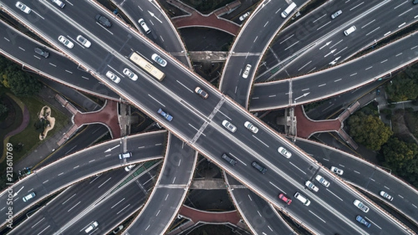 Fototapeta Aerial view of highway and overpass in Shanghai city on a cloudy day