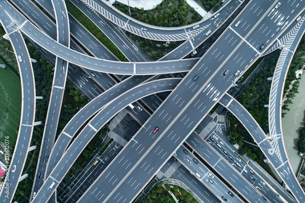 Fototapeta Aerial view of highway and overpass in city