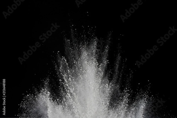 Fototapeta Explosion of white powder isolated on black background. Abstract of powder or clouds splatted.