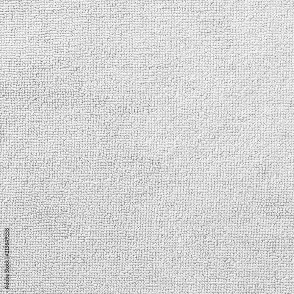 Fototapeta Carpet or white beach towel texture background in beige color made of wool or synthetic fibers, polypropylene, nylon or polyester material