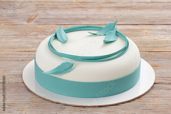 Obraz white mousse cake on wooden background 