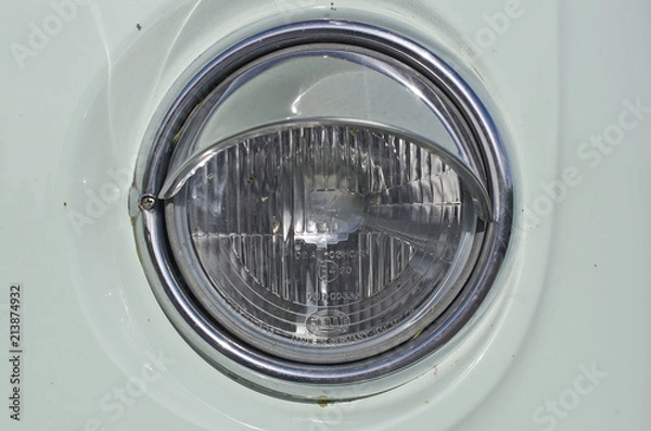 Fototapeta The round head light of the old classic vintage bus. 