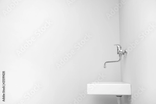 Obraz Sink in an empty big white room.
