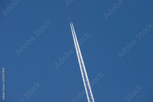 Obraz A aeroplane passes overhead