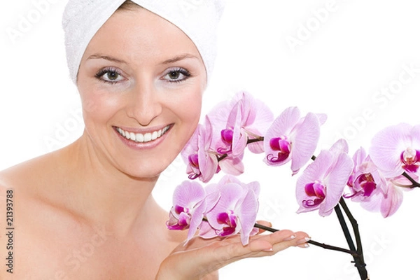 Obraz Caucasian woman with towel on head and violet orchide