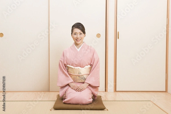 Obraz 着物を着てお辞儀をする女性