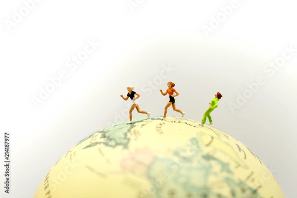 Fototapeta Miniature people : marathon runners with world map, jogging and running,healthy lifestyle and sport concepts.