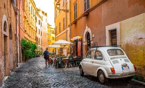 Obraz Przytulna ulica w Trastevere, Rzym, Europa. Trastevere to romantyczna dzielnica Rzymu, wzdłuż Tybru w Rzymie. Atrakcja turystyczna Rzymu.