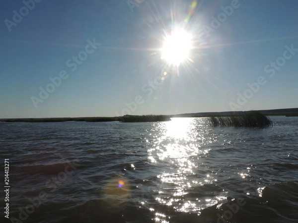 Obraz солнце садится над озером