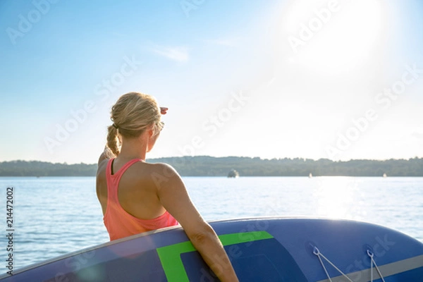 Obraz Yoga auf dem Stand Up Paddle Board