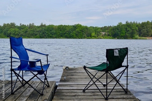 Obraz Sitting on the end of a dock in Greenville, Michigan enjoying the view