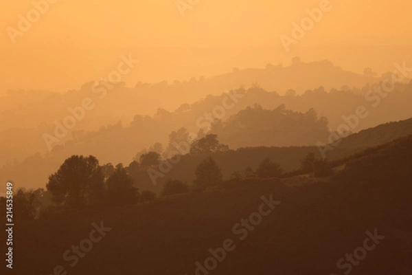 Obraz Orange Forest Fire Haze in Closeup Ridges of the Sierra Foothills