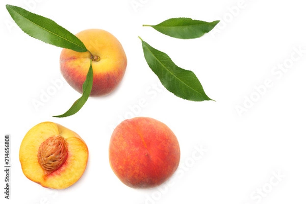 Fototapeta peach fruit with green leaf and slices isolated on white background. top view