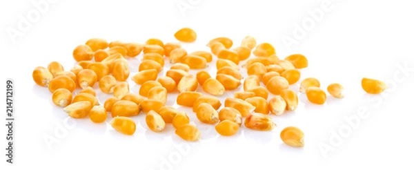 Fototapeta Dried yellow corn kernels on white background.