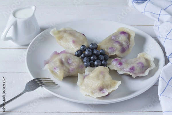 Obraz Vareniki (pierogi, dumplings) with blueberries