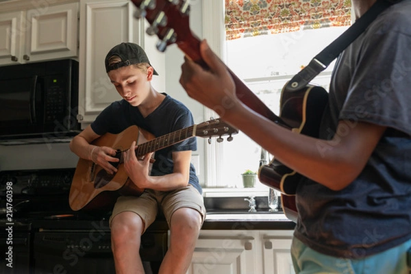Fototapeta Playing Guitar with Friends After School