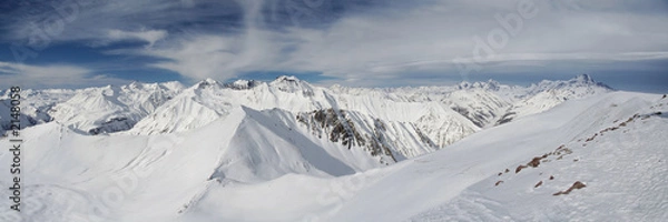 Obraz high snow mountains under cloudy sky