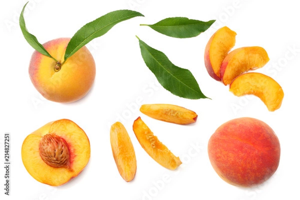 Fototapeta peach fruit with green leaf and slices isolated on white background. top view